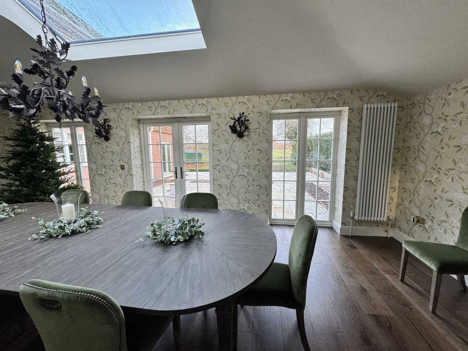 Finished single-storey extension with roof lantern and French doors