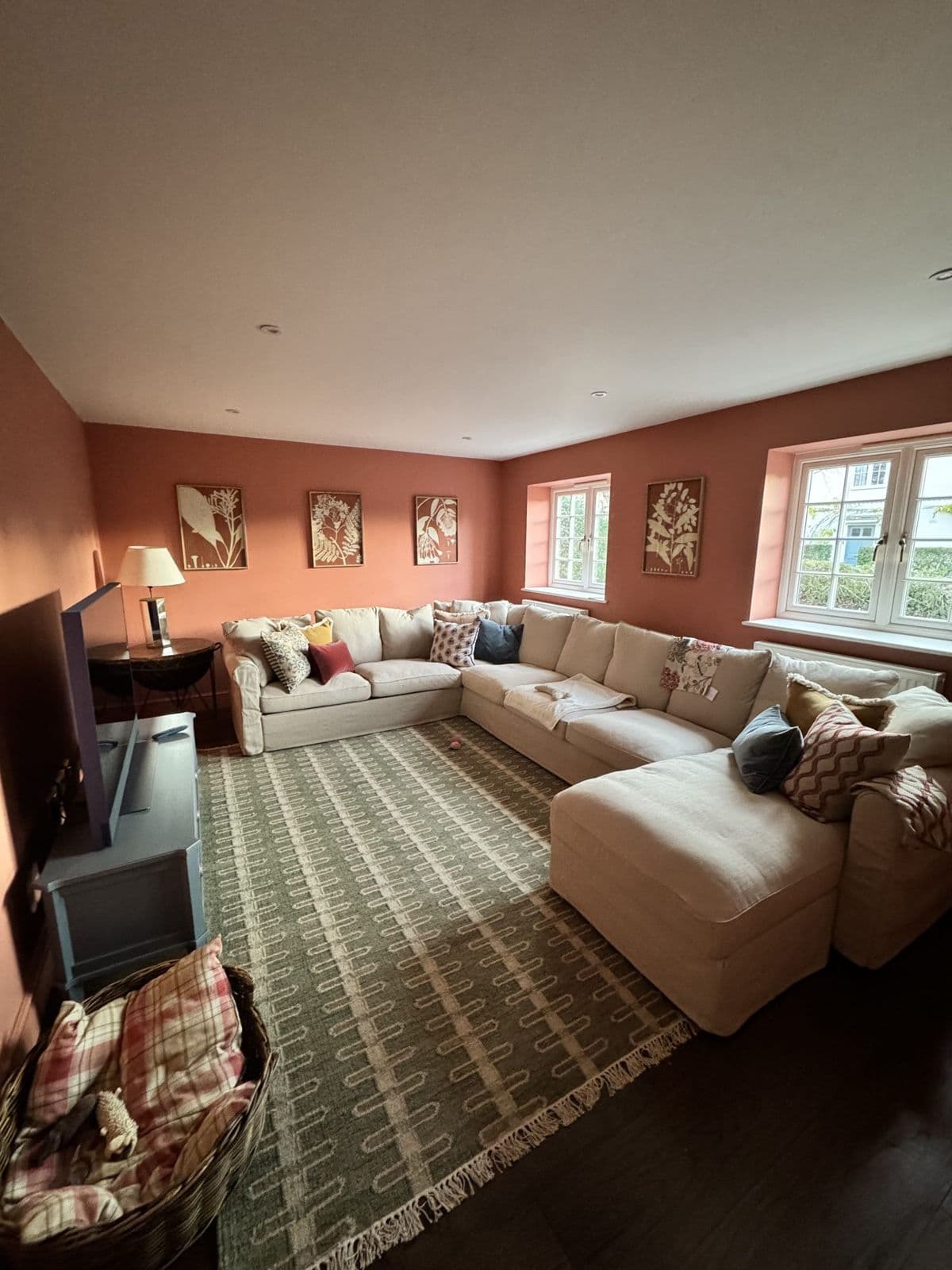 Renovated living room with new windows and finishes