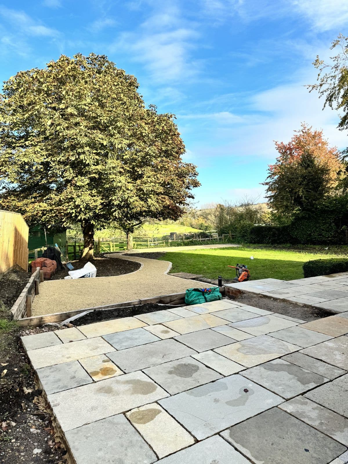 Newly laid stone patio in a large garden